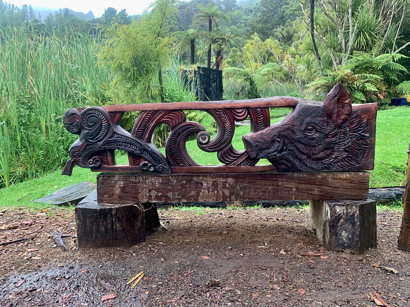 Custom made carving with wild boar and figure